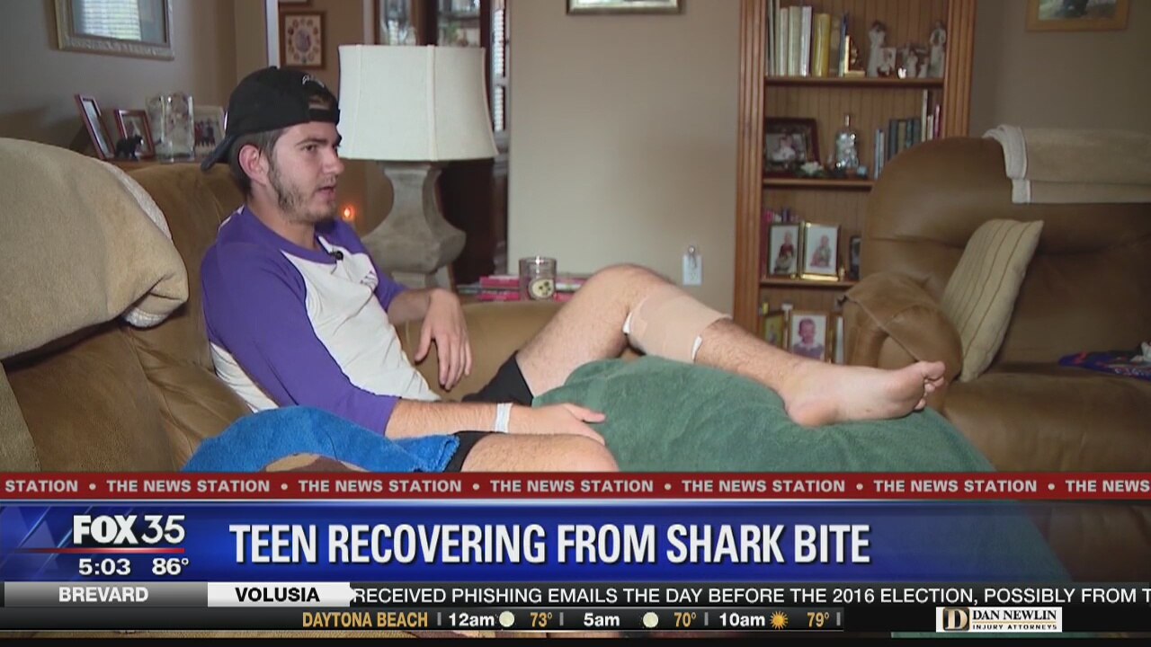 Teen bit by shark while in waist-deep water
