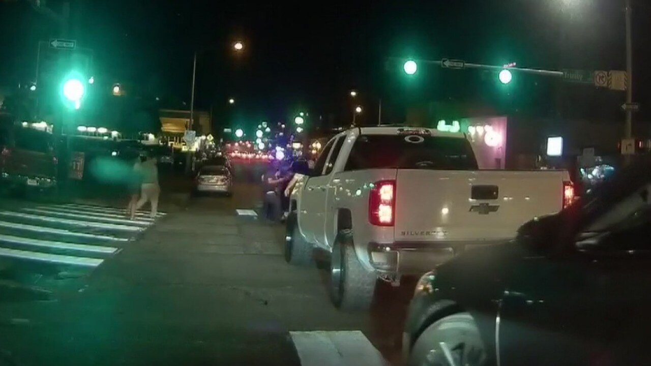 Dashcam video captures moment truck hits man, woman in crosswalk