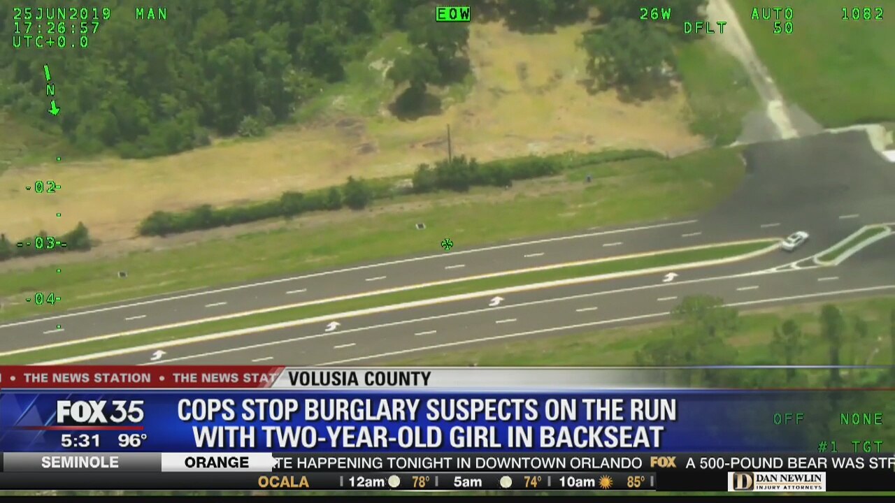Burglary suspects on the run with toddler in back seat