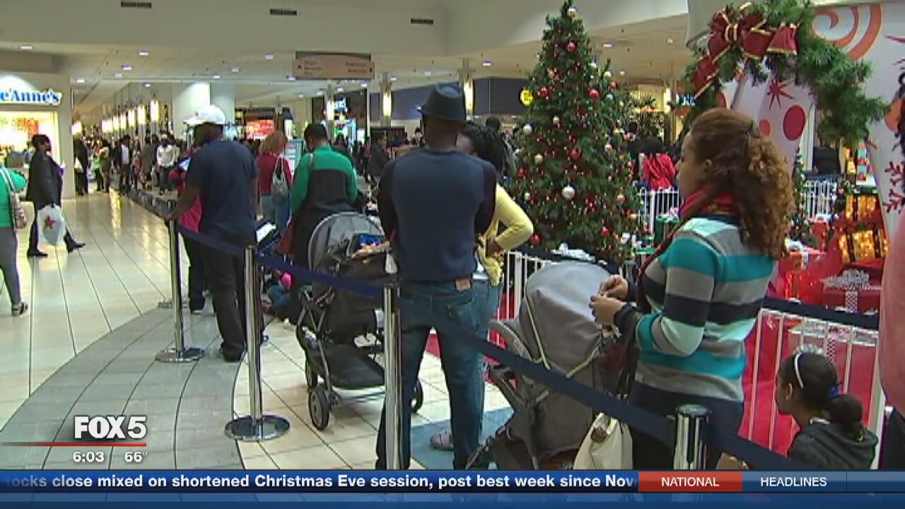 Last-minute holiday shoppers hit the malls on Christmas Eve
