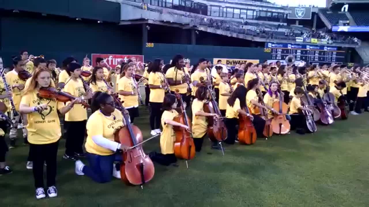 OUSD band kneels during anthem