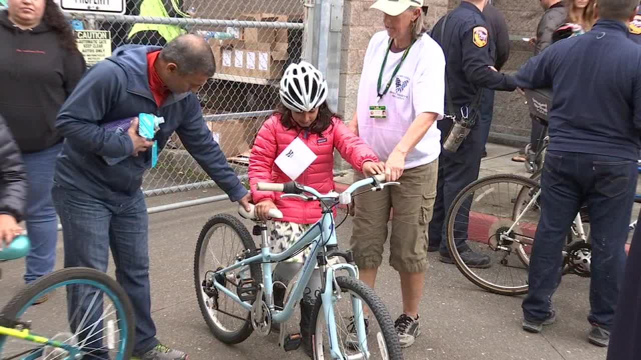 Marin firefighters hand out bikes to wildfire victims