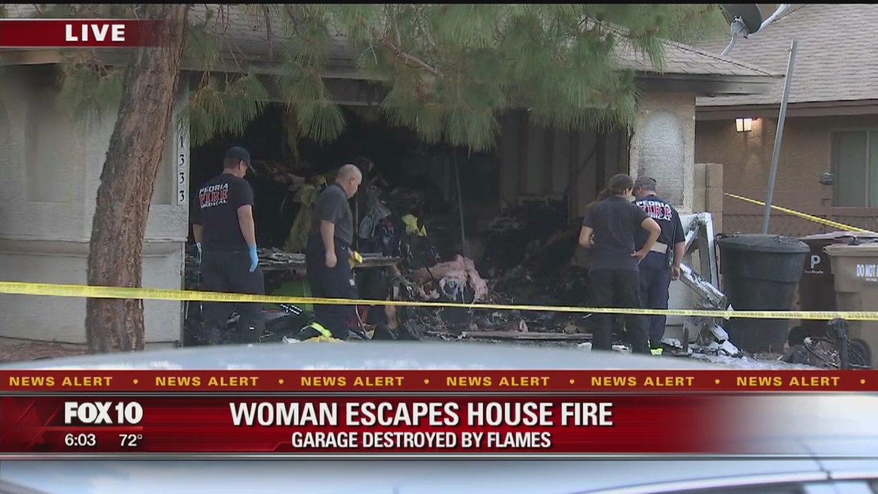 Smoke detectors alert woman to 'suspicious' garage fire