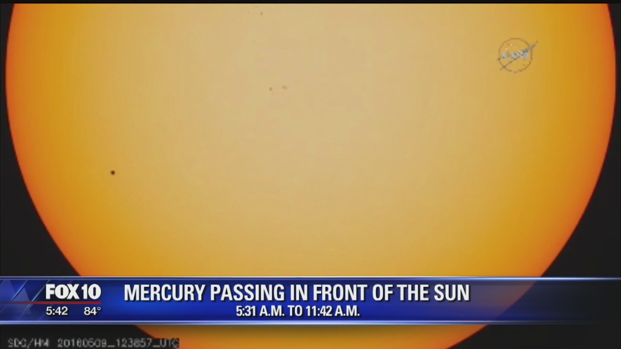 Little Mercury a black dot as it crosses vast face of sun