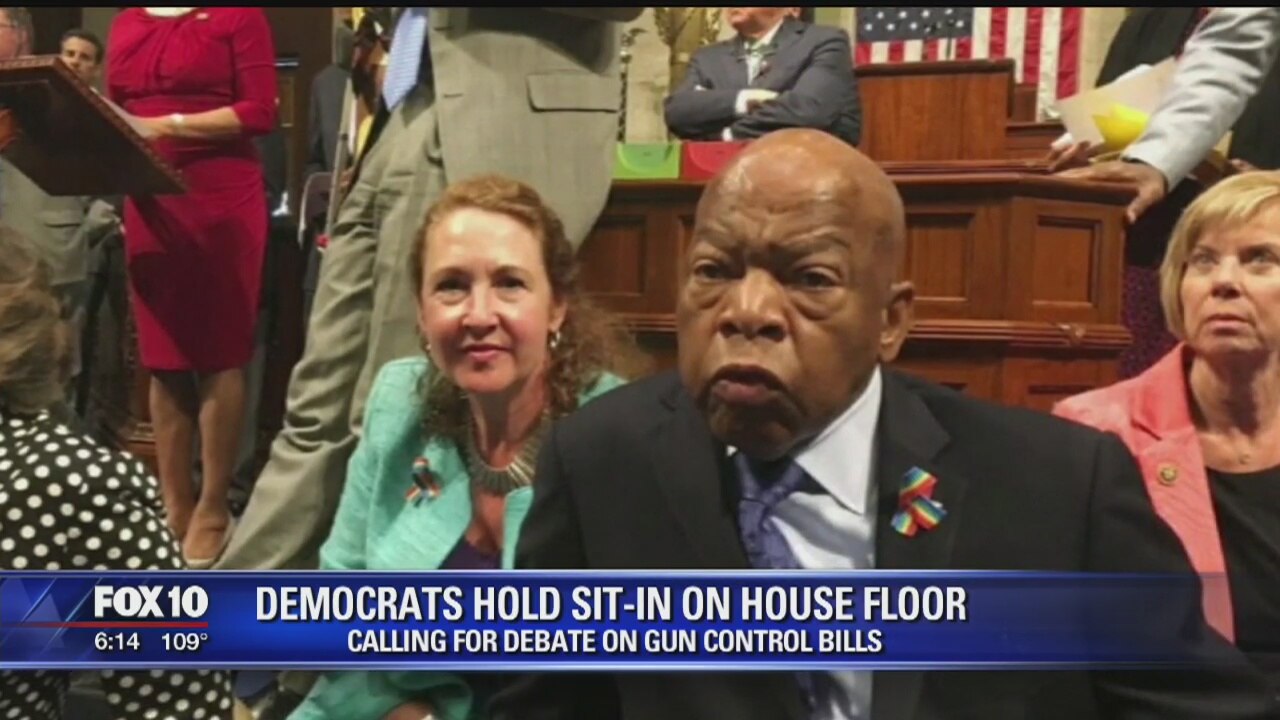 Rebellious Democrats disrupt House, stage protest over guns