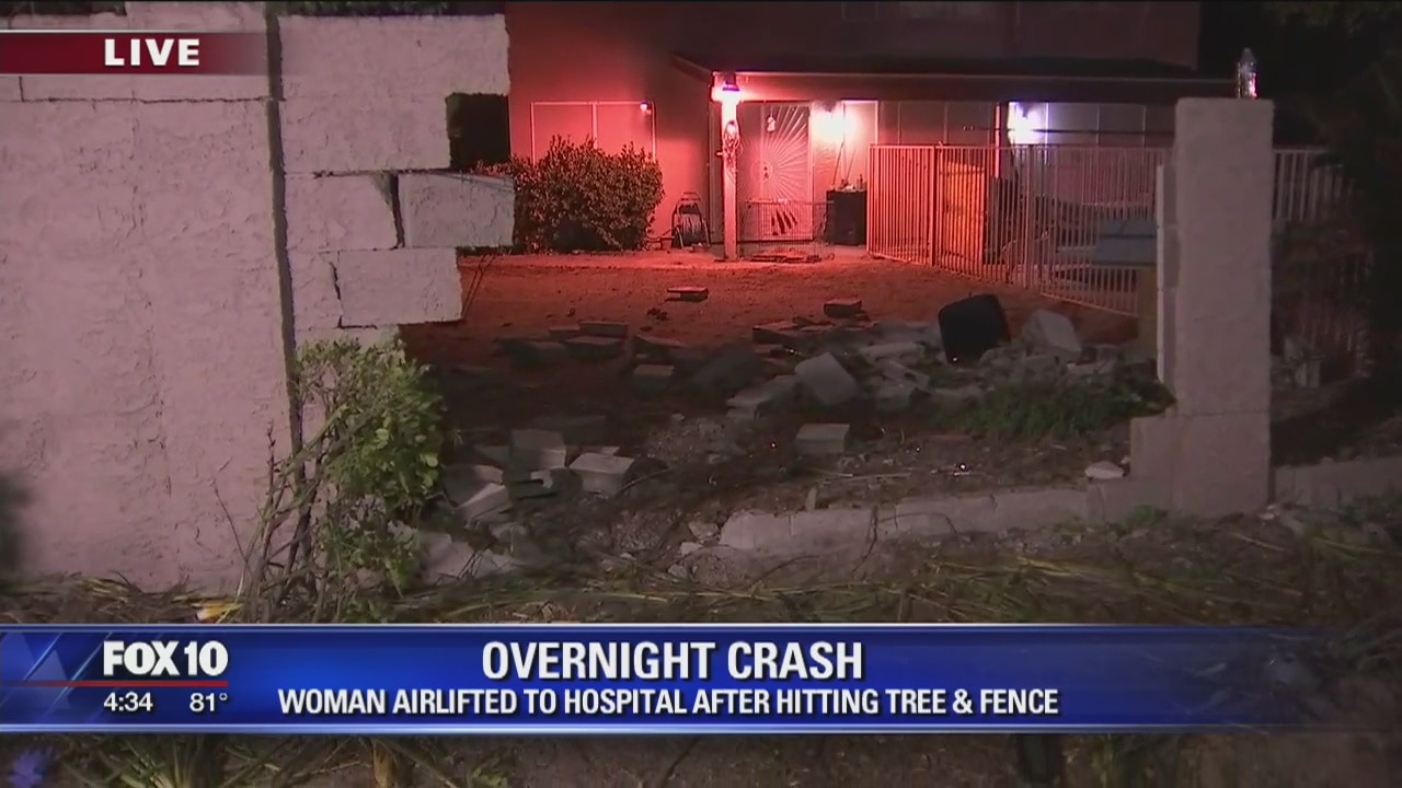 Woman in critical condition after crashing into tree, wall