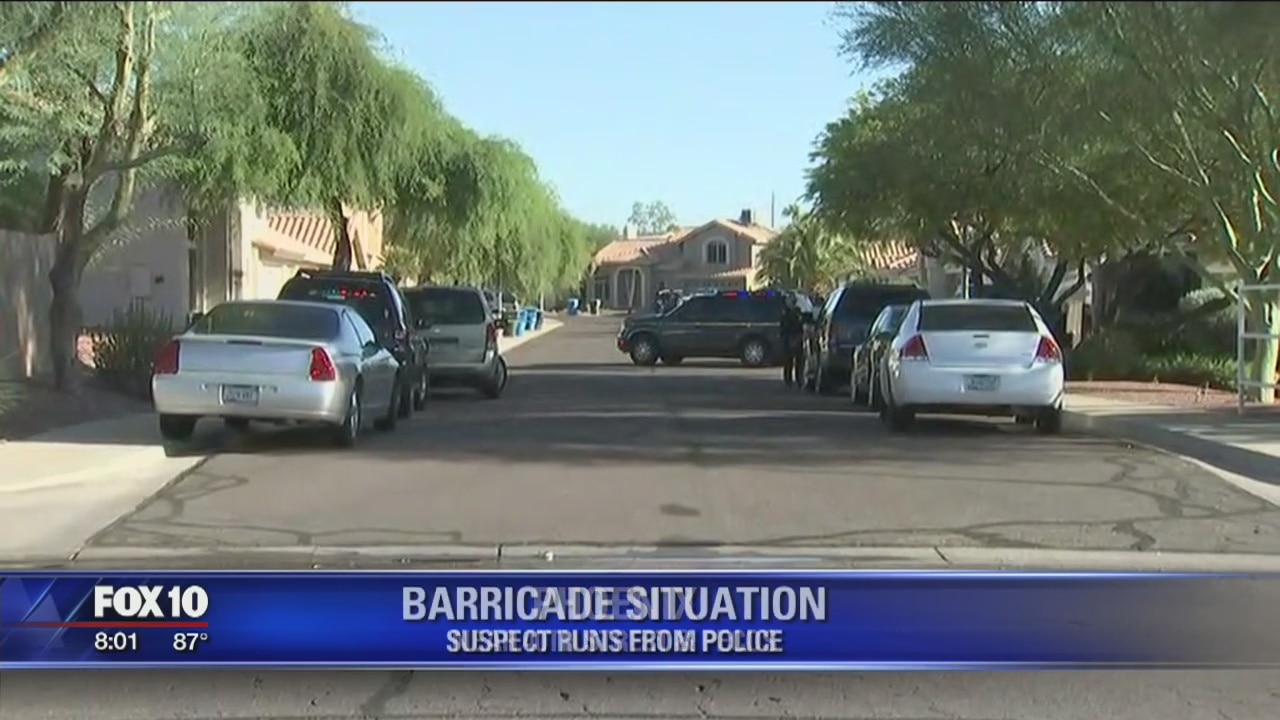 Police: Suspect barricades himself inside Phoenix home