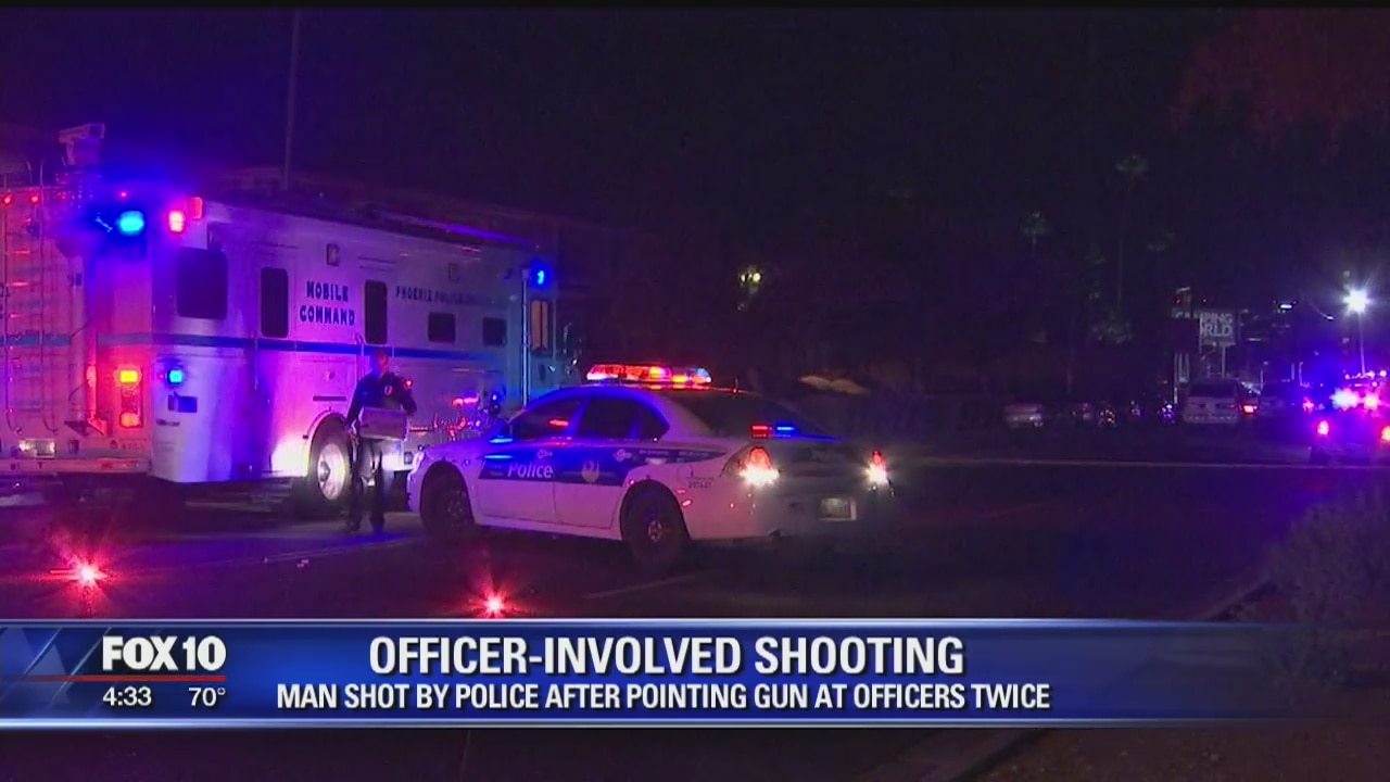 Police: Man in body armor shot after pointing gun at officers