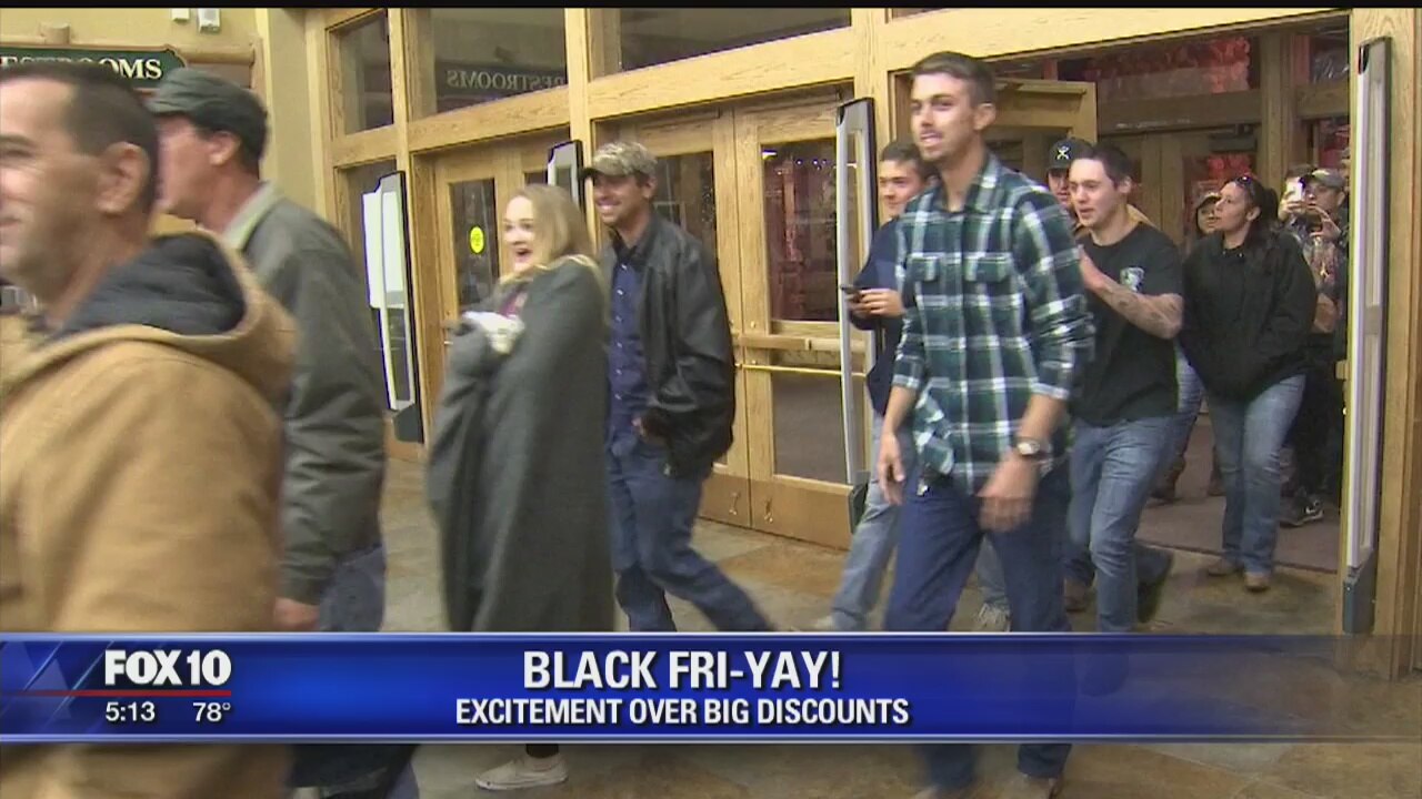 Shoppers Rush For Black Friday Discounts