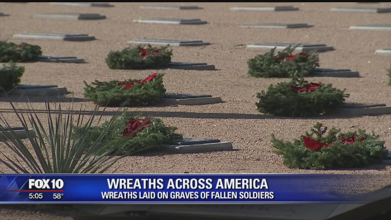 Veteran volunteers laid holidays wreaths in honor of fallen soldiers