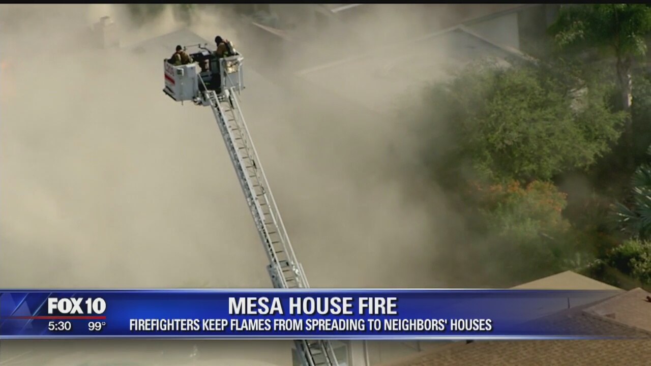 Mesa firefighters work hard to save homes near fierce house fire