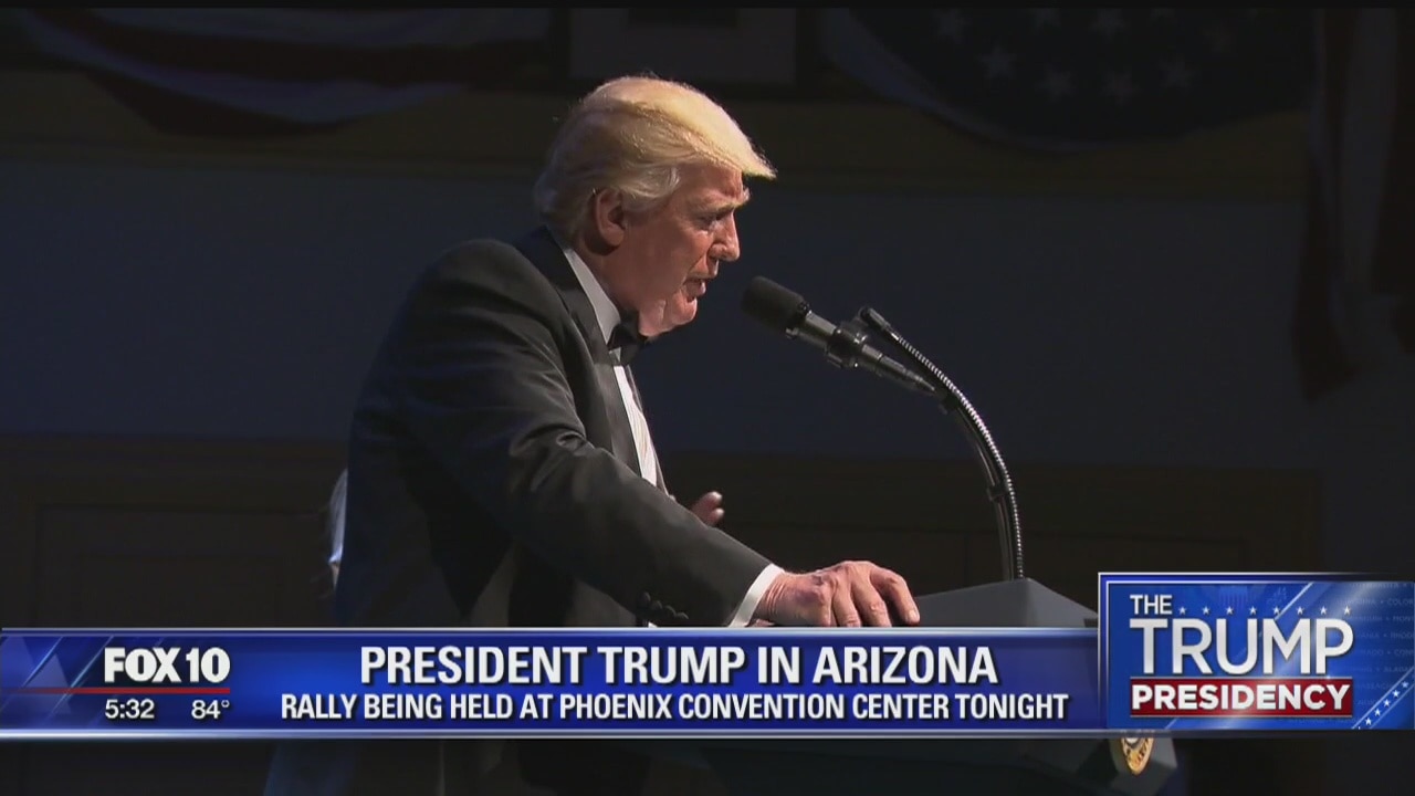 Questions on immigration, race follow Trump to Arizona