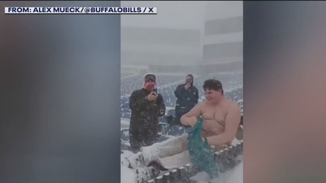 Shirtless Buffalo Bills fan becomes human snowplow