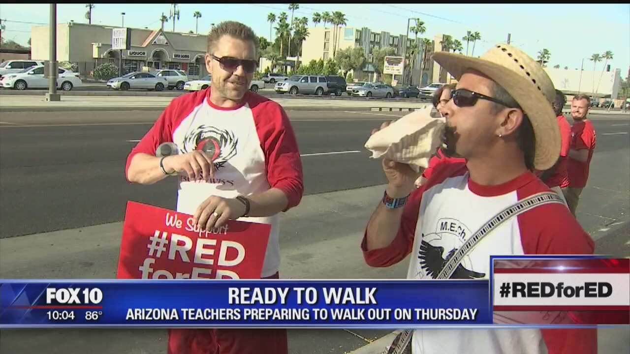 Teachers rally on the eve of school walkout