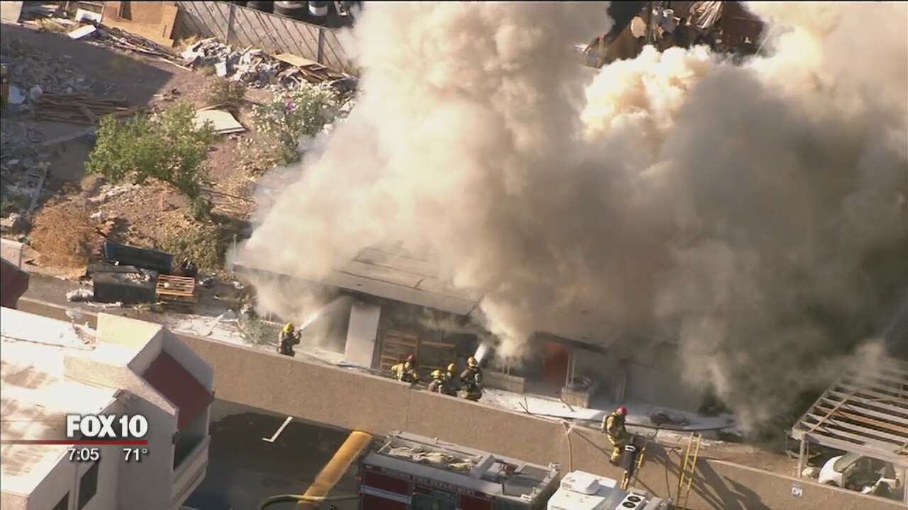 Firefighters battling 1st-alarm fire at abandoned apartment complex