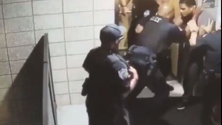 Video showing use of physical force by uniformed officers surfaced