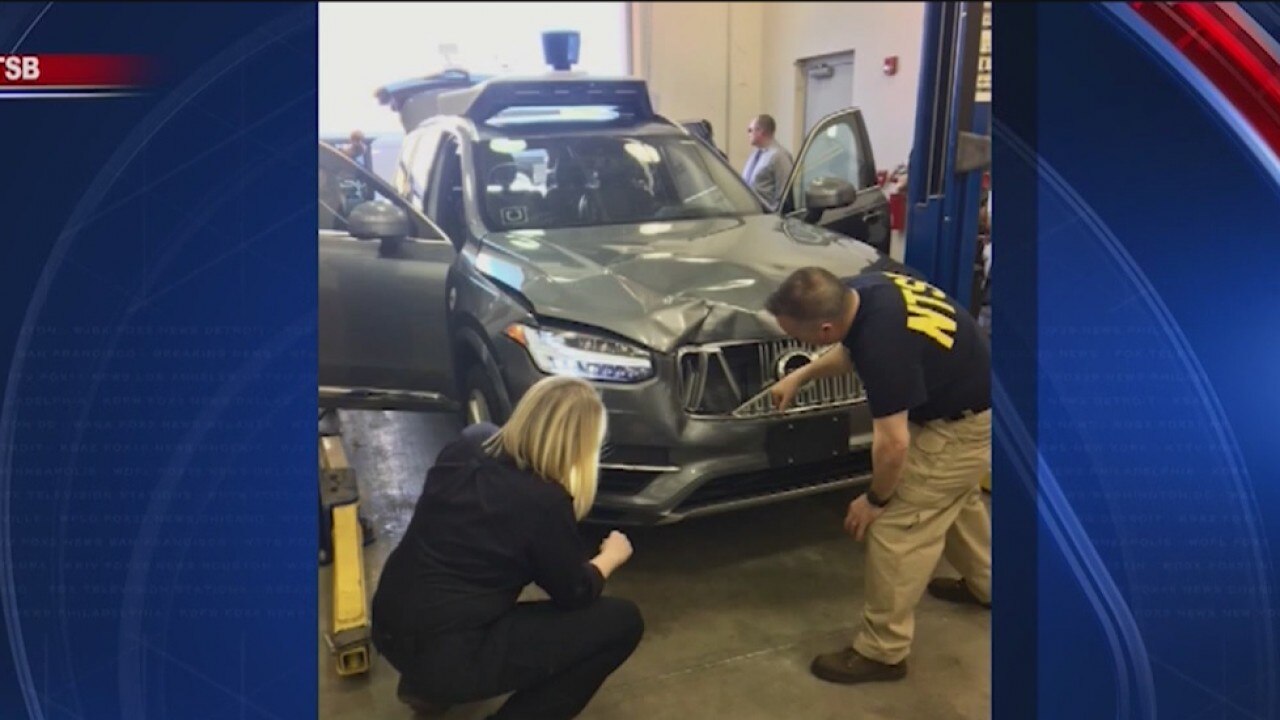 Tempe police release body cam footage, photos from deadly Uber crash