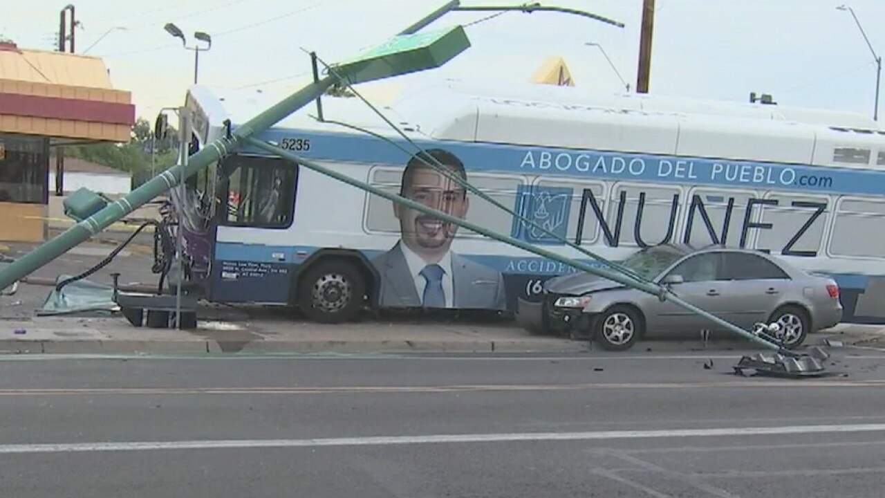 Valley bus crash topples light pole