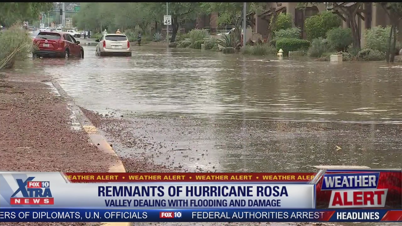 Nearly a dozen people rescued from flooded cars