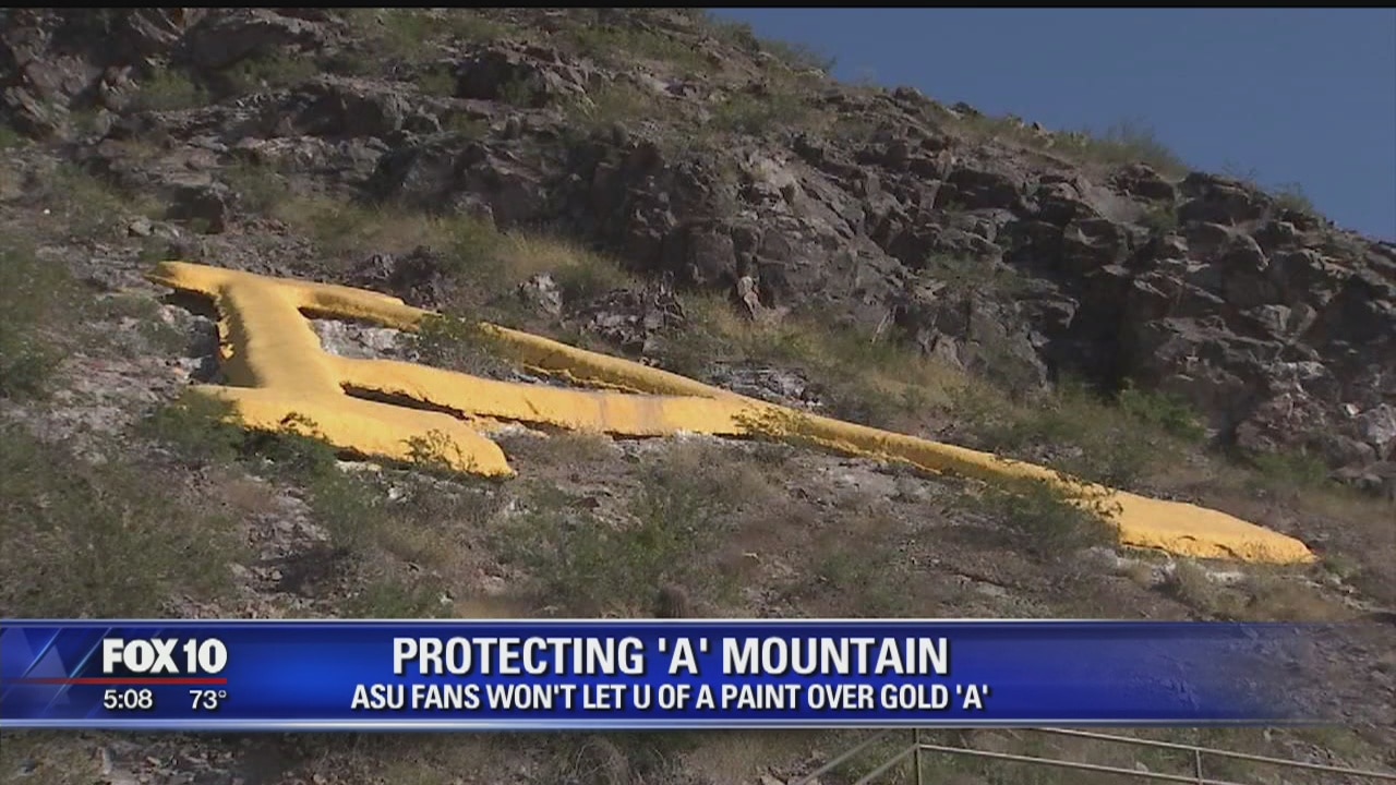 ASU fans helping to protect Tempe's "A" Mountain from U of A fans