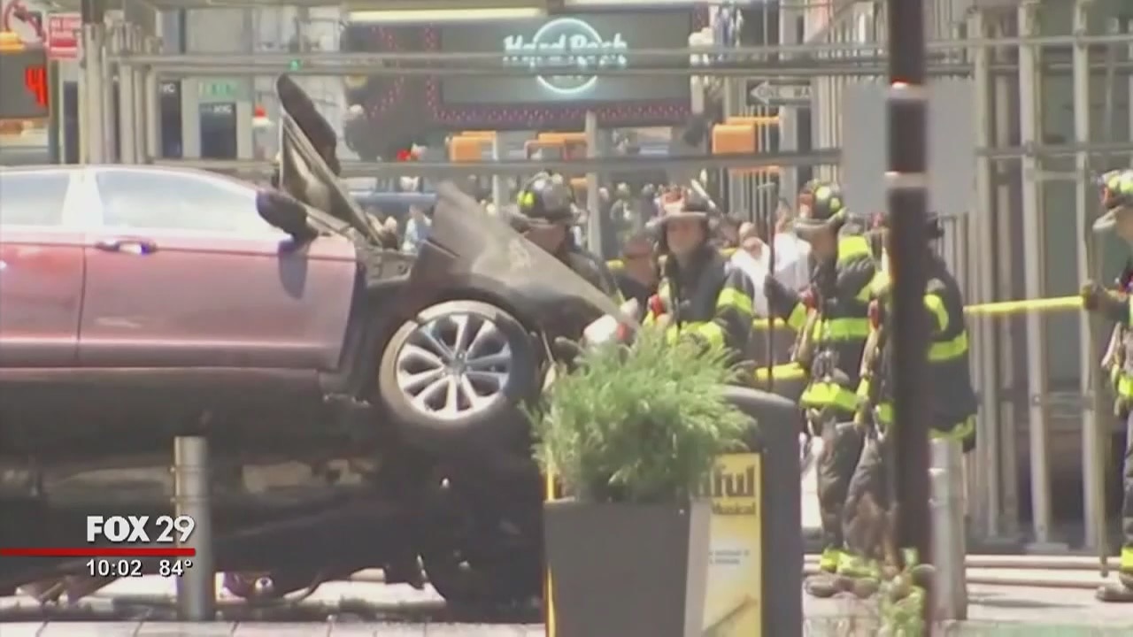 Car slams into Times Square crowd, killing teen