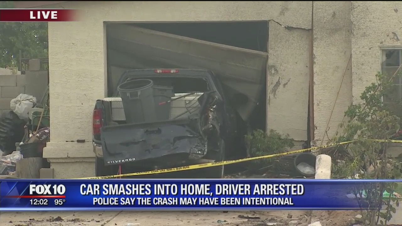 Car smashes into home, driver arrested