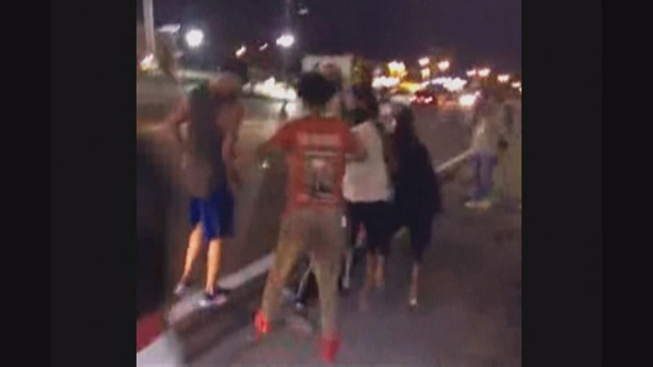 Car hits protester in Ferguson on second anniversary of Michael Brown's death, shots ring out