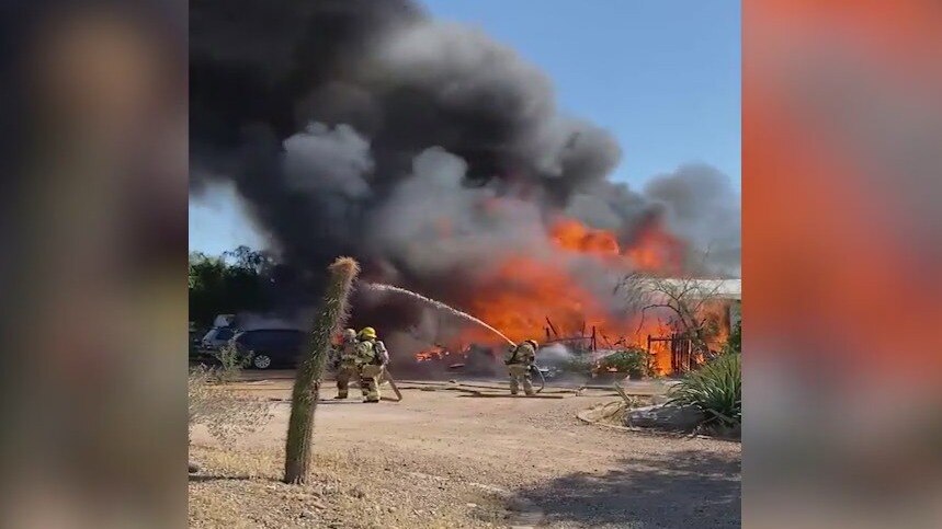 Multiple people burned in north Phoenix double house fire