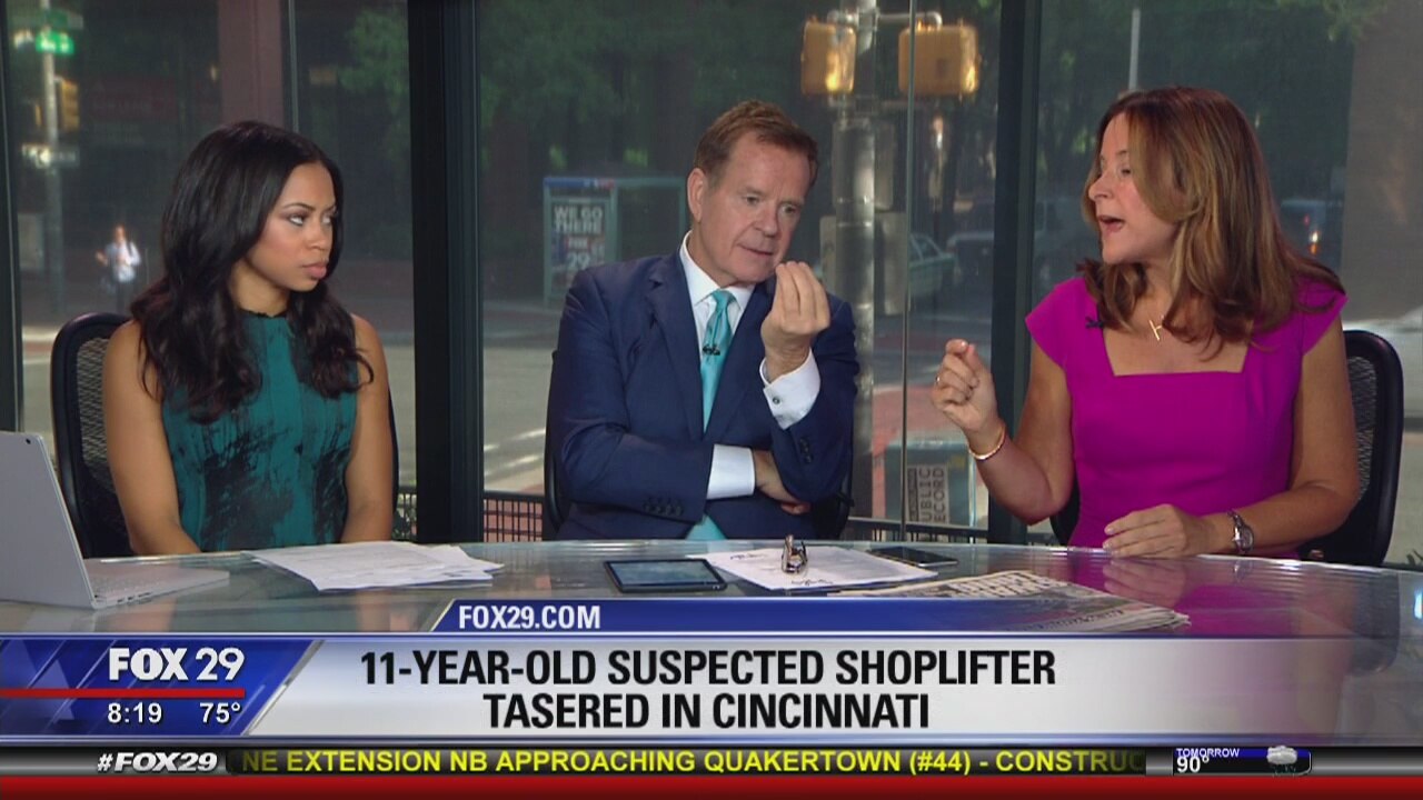 A security guard uses a taser on an 11-year-old shoplifter
