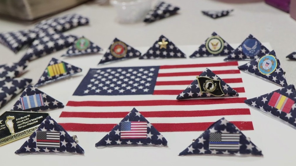 Woman makes flag pins for Gold Star families