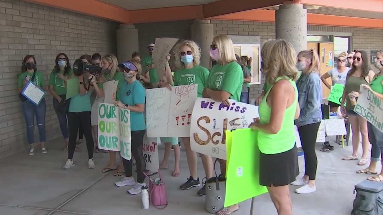 Parents gather for protest as Paradise Valley Unified sets staggered return to schools schedule