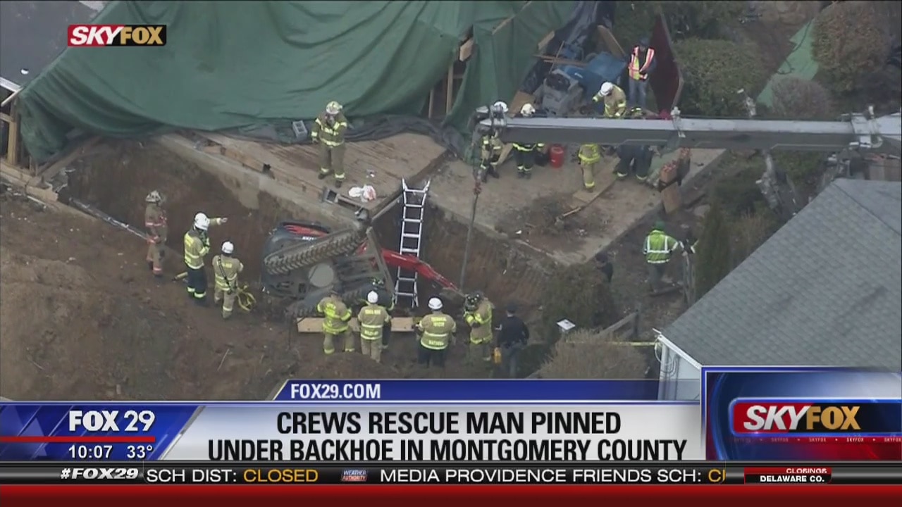 Crews rescue man pinned under backhoe in Upper Merion Township