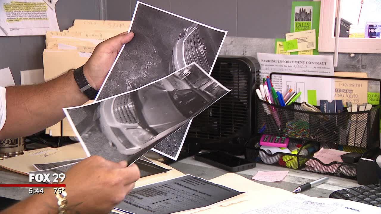 Local towing company shows photos of car parked in handicap spot without placard