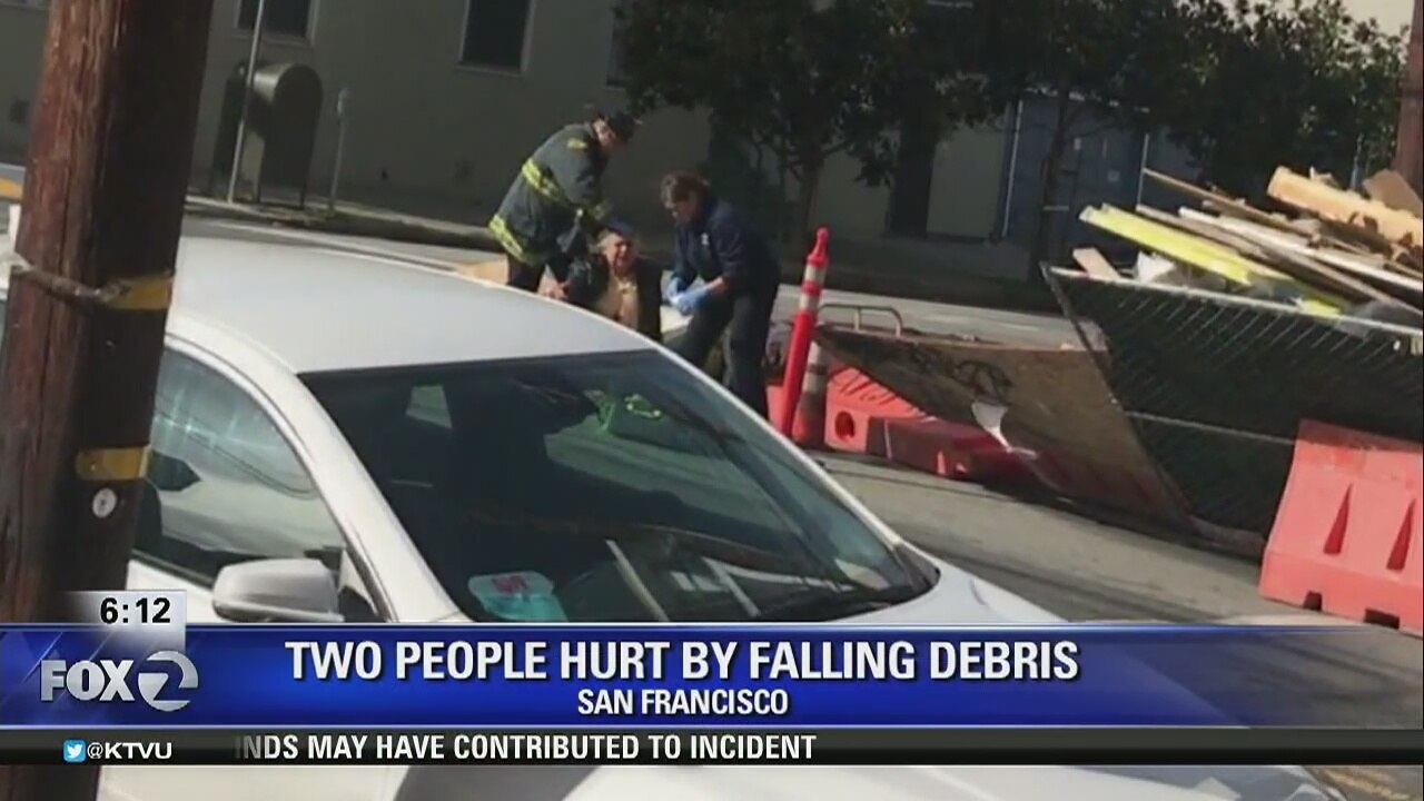 Windstorm sends debris flying, injuring two people