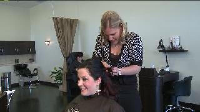 Laura tries her hand at styling hair