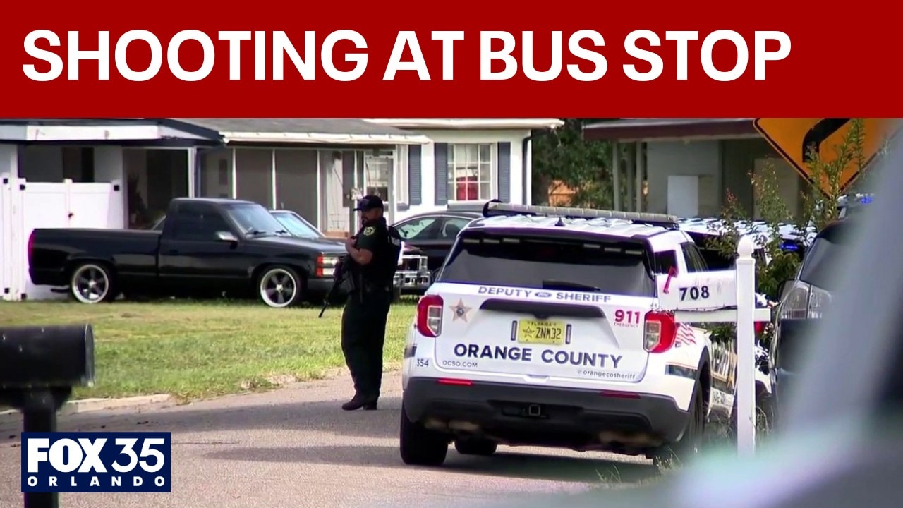 Woman shot at bus stop, standoff a block away
