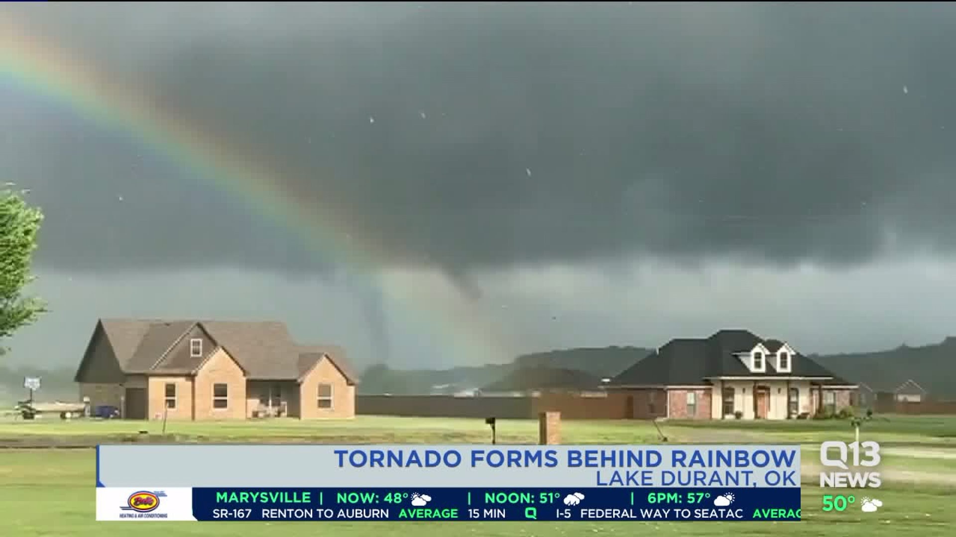 Tornado forms behind rainbow in Oklahoma