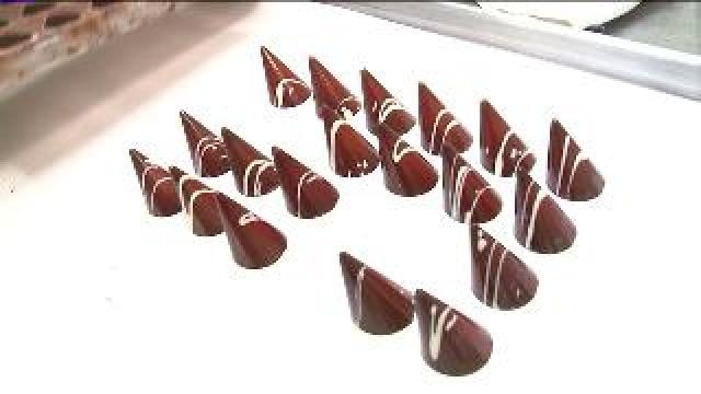 Watching the creation of custom chocolates