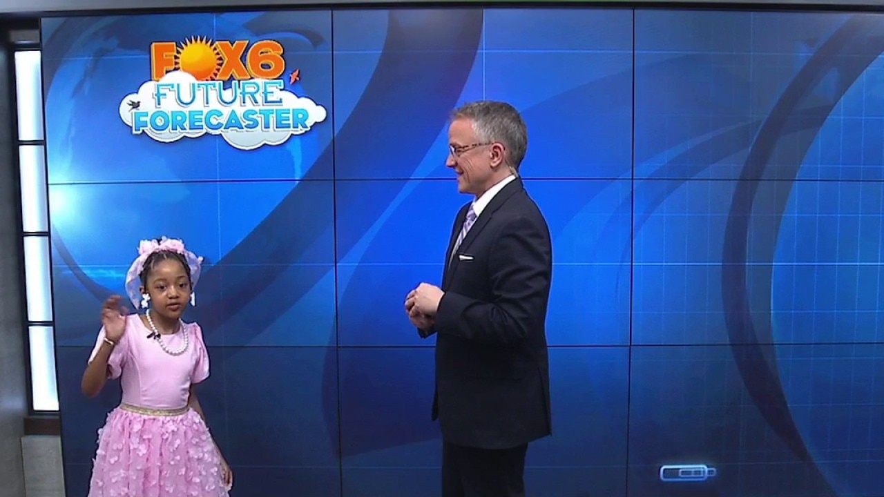 Briella helps Rob with the weather