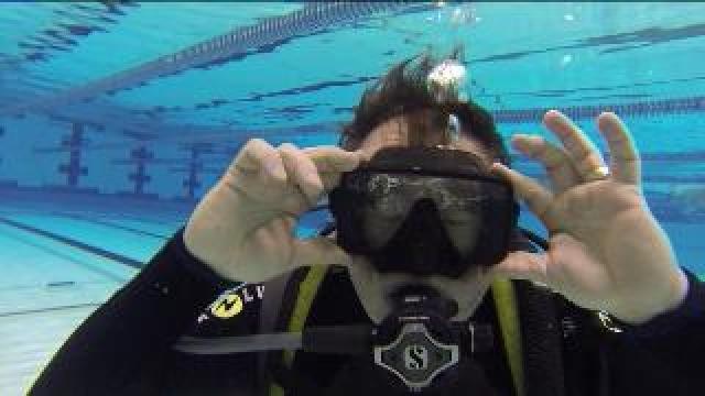 Chip hits the water, learns to scuba dive