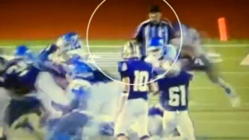 Jay High School football players blind-side ref