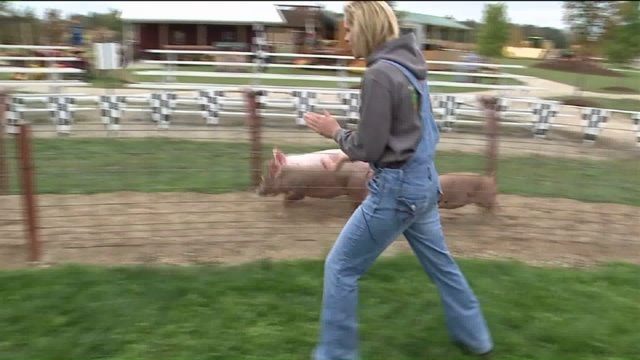 Carl enjoys a pig race at Basse`s Taste of Country
