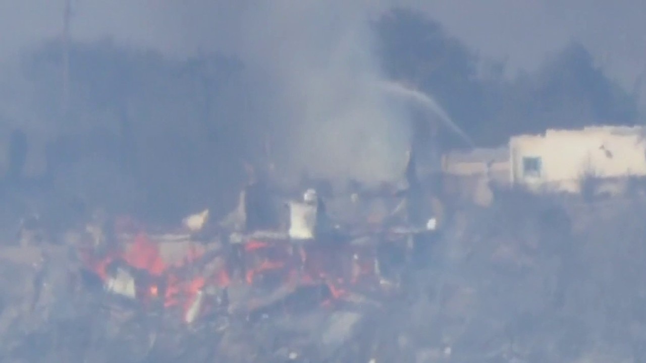 House collapses during brush fire 