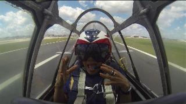 Cassandra flies with the GEICO Skytypers