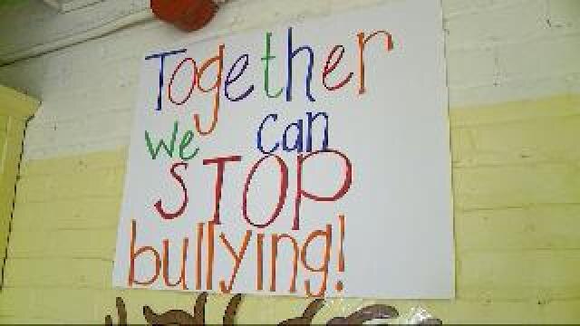 Anti-bullying volunteers teach children about acceptance