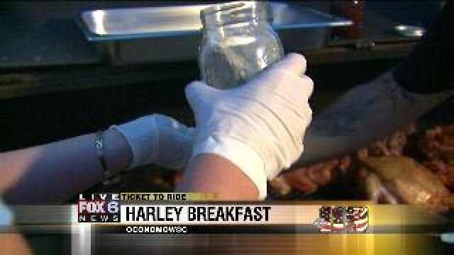Laura helps prepare a Harley breakfast