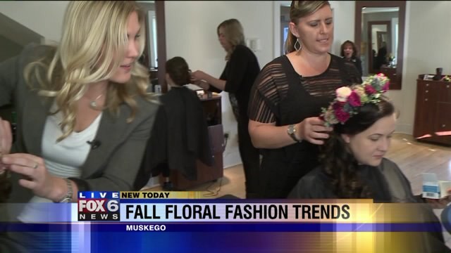 Laura learns how to put flowers in hair for bride and bridesmaid