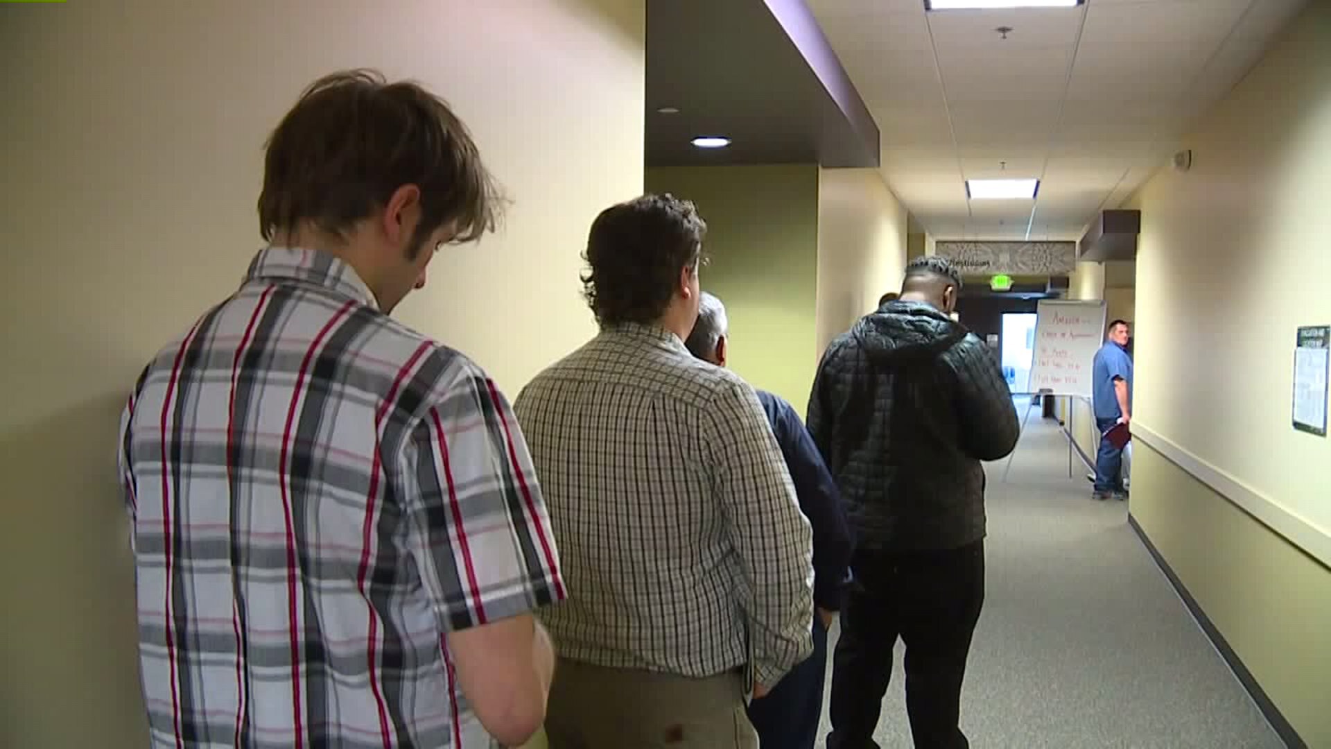People line up to apply as Amazon starts hiring