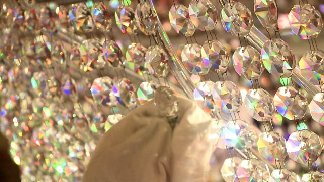 The Pabst Theater`s chandelier gets a thorough cleaning