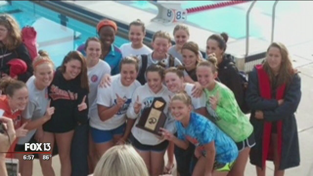 Collegiate swimmer encourages kids to jump in